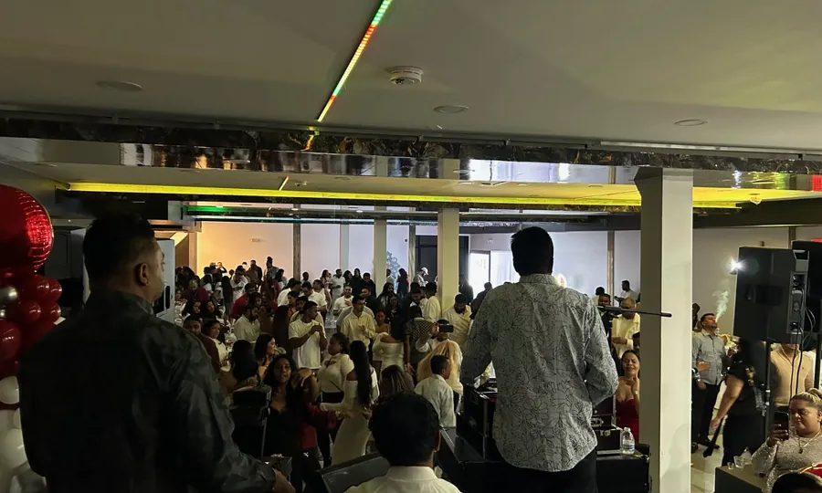 Full banquet hall of guests at a reception